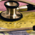 stethoscope resting on the map of the USA